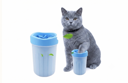 Cove Paw muddy paw cleaning cup being used on a cat's paw
